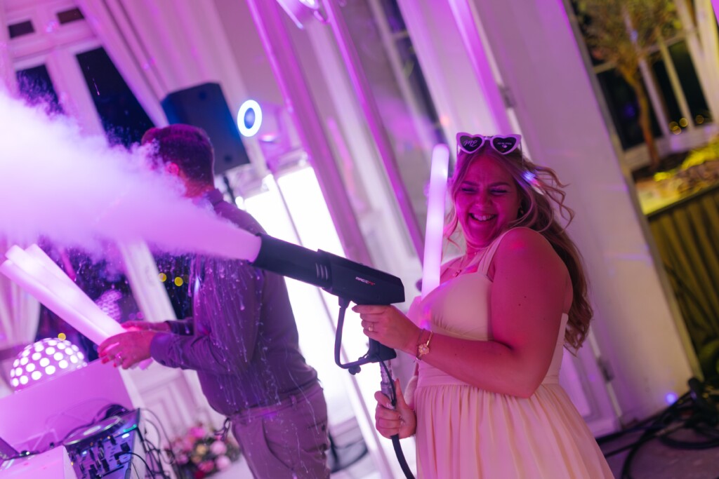 Guest with a CO2 shooter on the dance floor