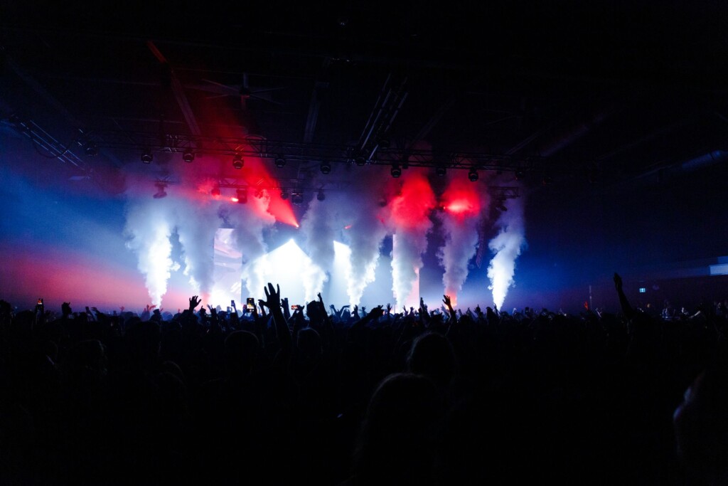 Vertical smoke columns with coloured light
